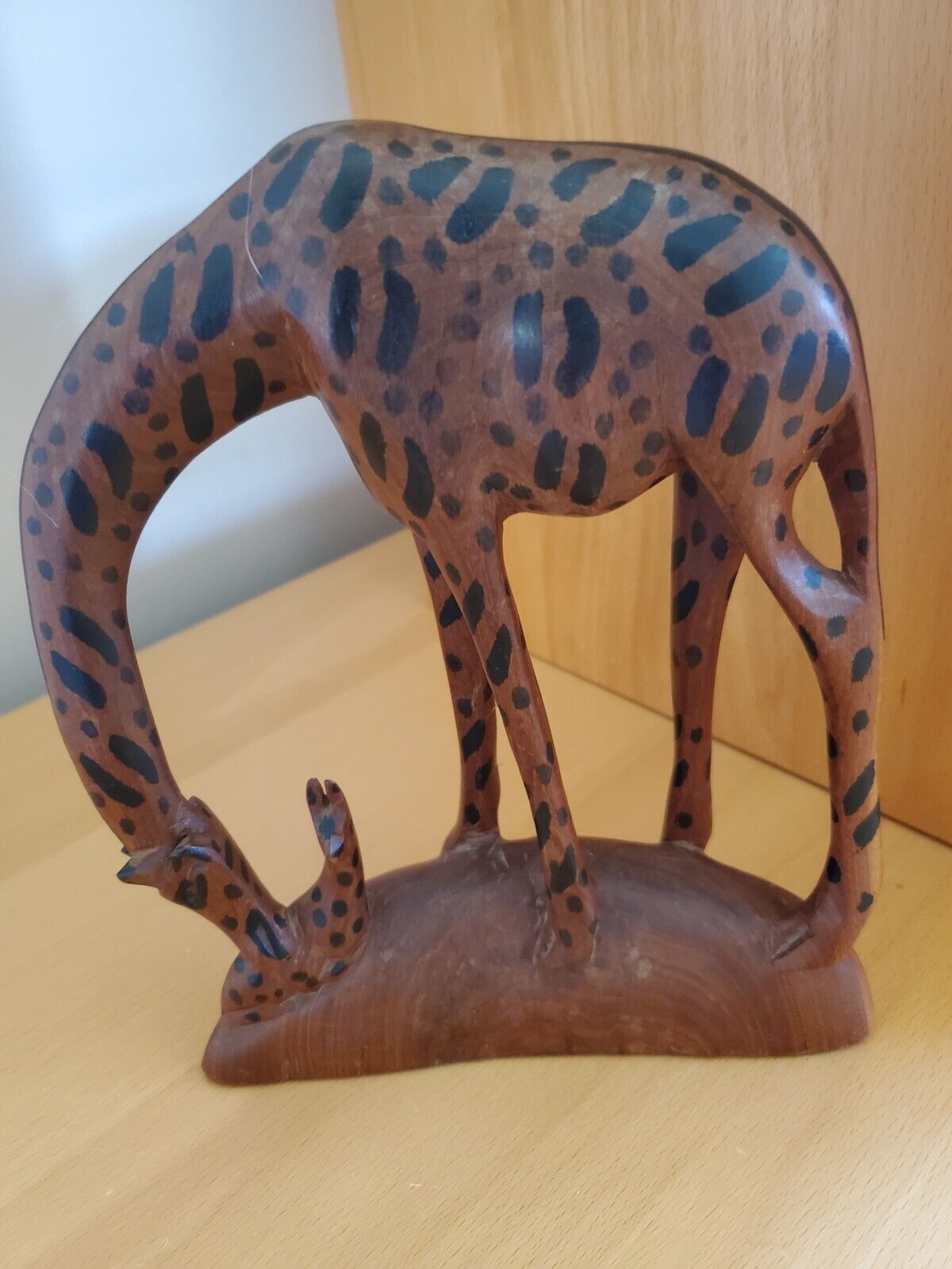 Hand carved wooden giraffe & baby figurine. Made inin Kenya. 8.5\