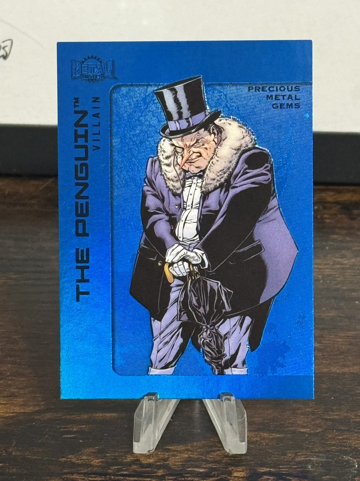 2025 Skybox Metal Universe Batman High Series PMG Blue 12/50 The Penguin #109 2025 Skybox Metal Universe Batman High Series PMG Blue 12/50 The Penguin #109