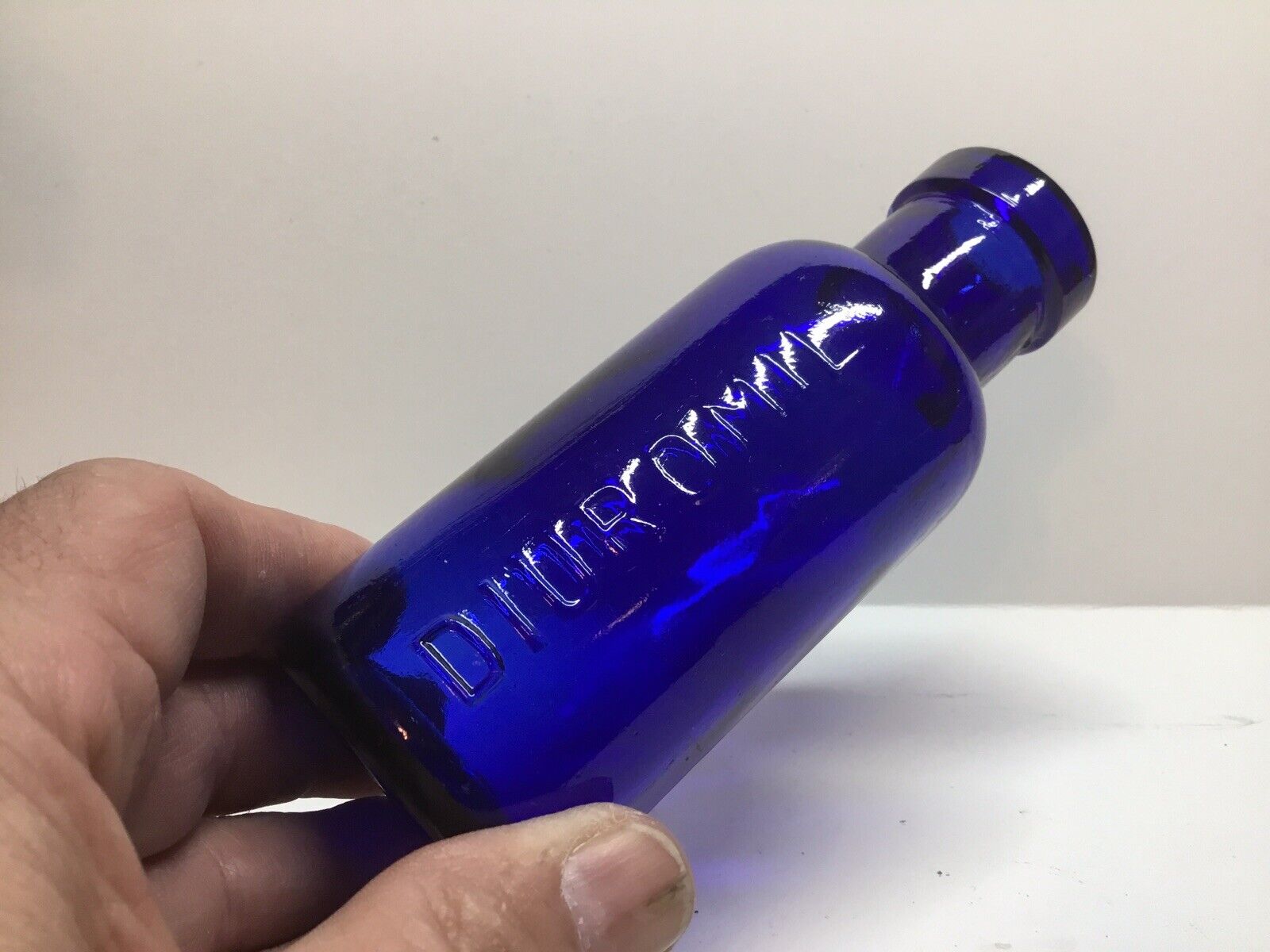 Round Antique Diuromil Cobalt Blue Medicine Bottle.