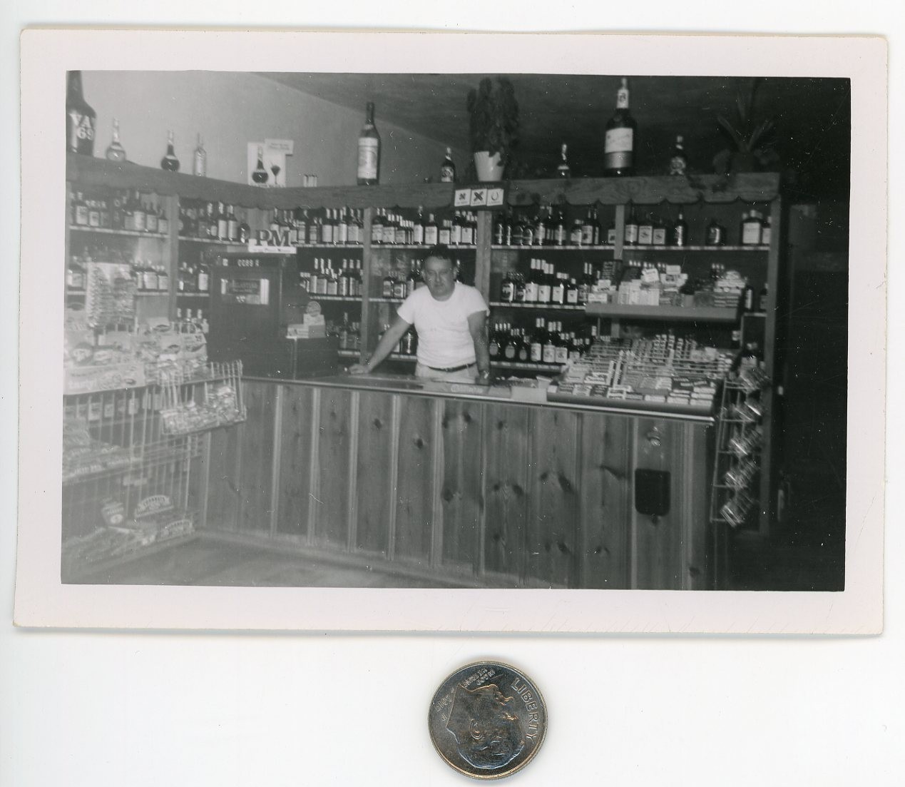 Old 1960\'s snapshot / Interior of LIQUOR STORE We Gots Booze Cigarettes & Chips