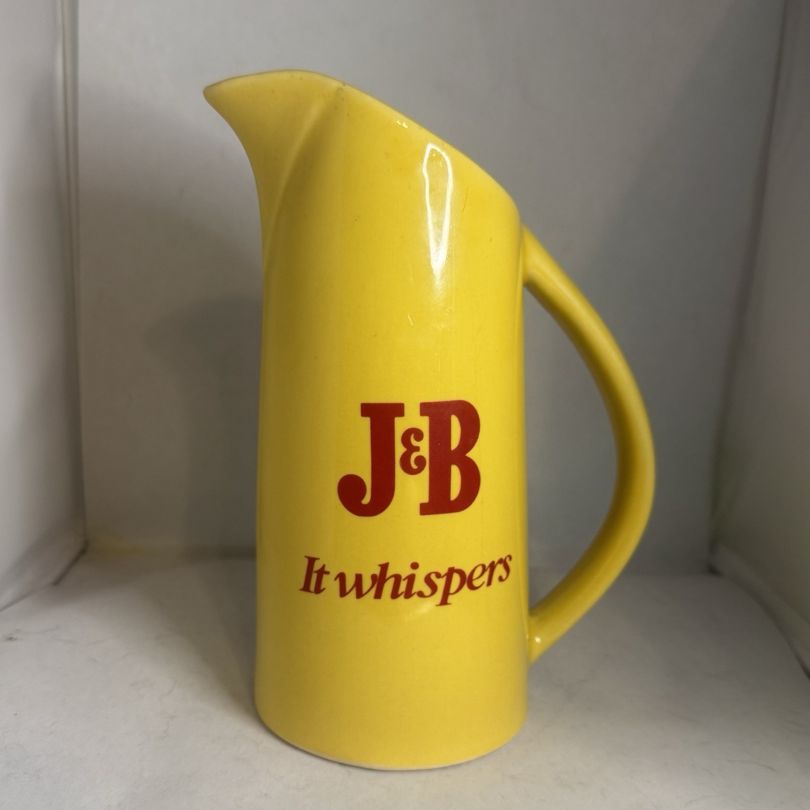 Vintage J&B Scotch Whiskey Pitcher Yellow With Red Logo It Whispers 6-7.75” Tall Vintage J&B Scotch Whiskey Pitcher Yellow With Red Logo It Whispers 6-7.75” Tall