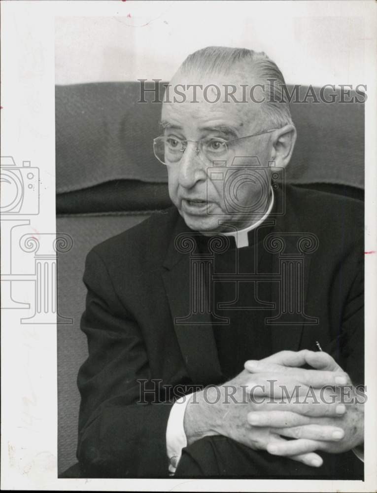 1969 Press Photo Monsignor James Meehan poses at his office - lra80032 1969 Press Photo Monsignor James Meehan poses at his office - lra80032