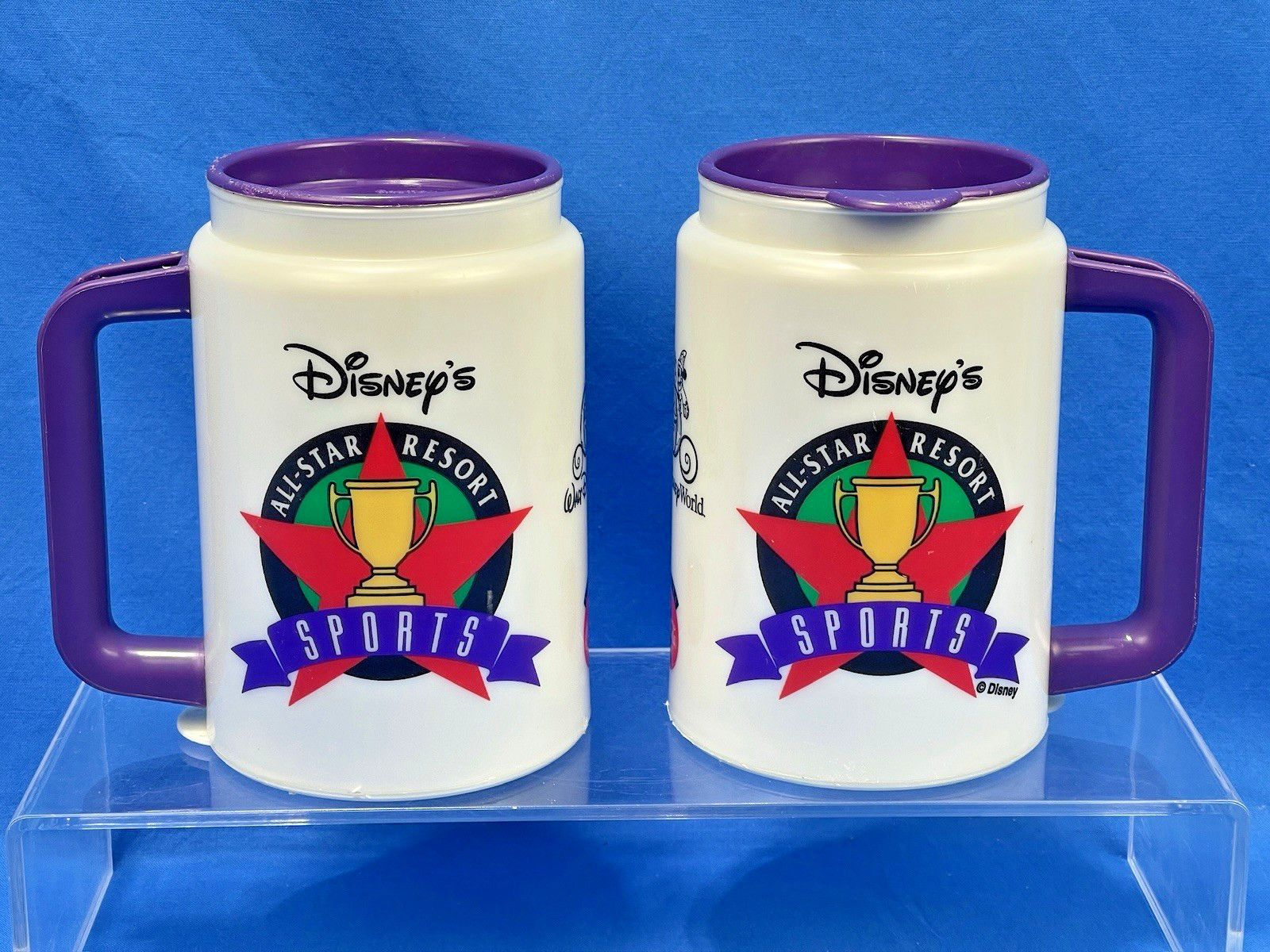 Disney\'s All-Star Resort Sports Refillable Mugs - 25th Anniversary - Purple Disney\'s All-Star Resort Sports Refillable Mugs - 25th Anniversary - Purple