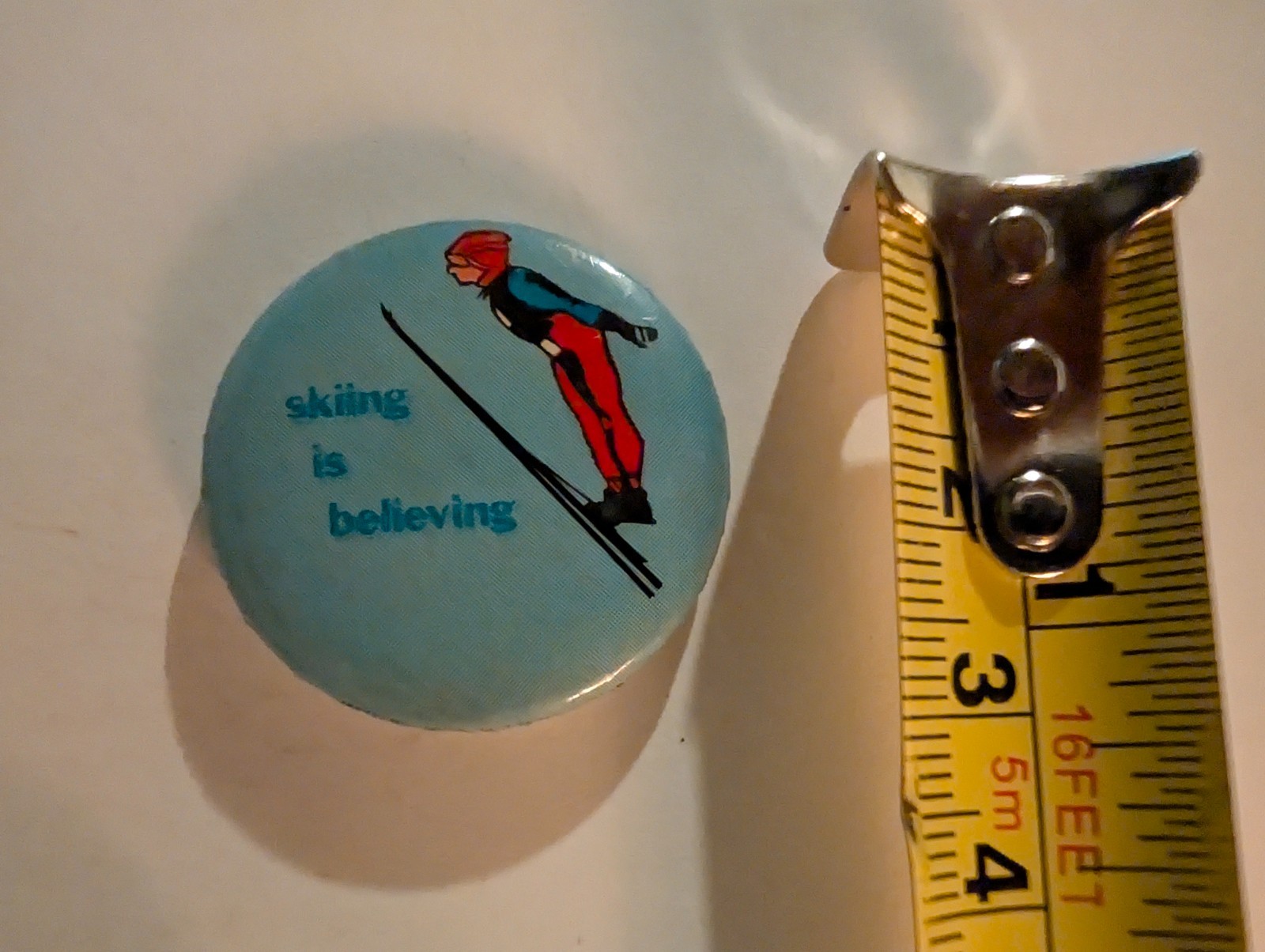Vintage Pin Pinback Button Skiing Is Believing Cute Ski Winter Sports Exercise