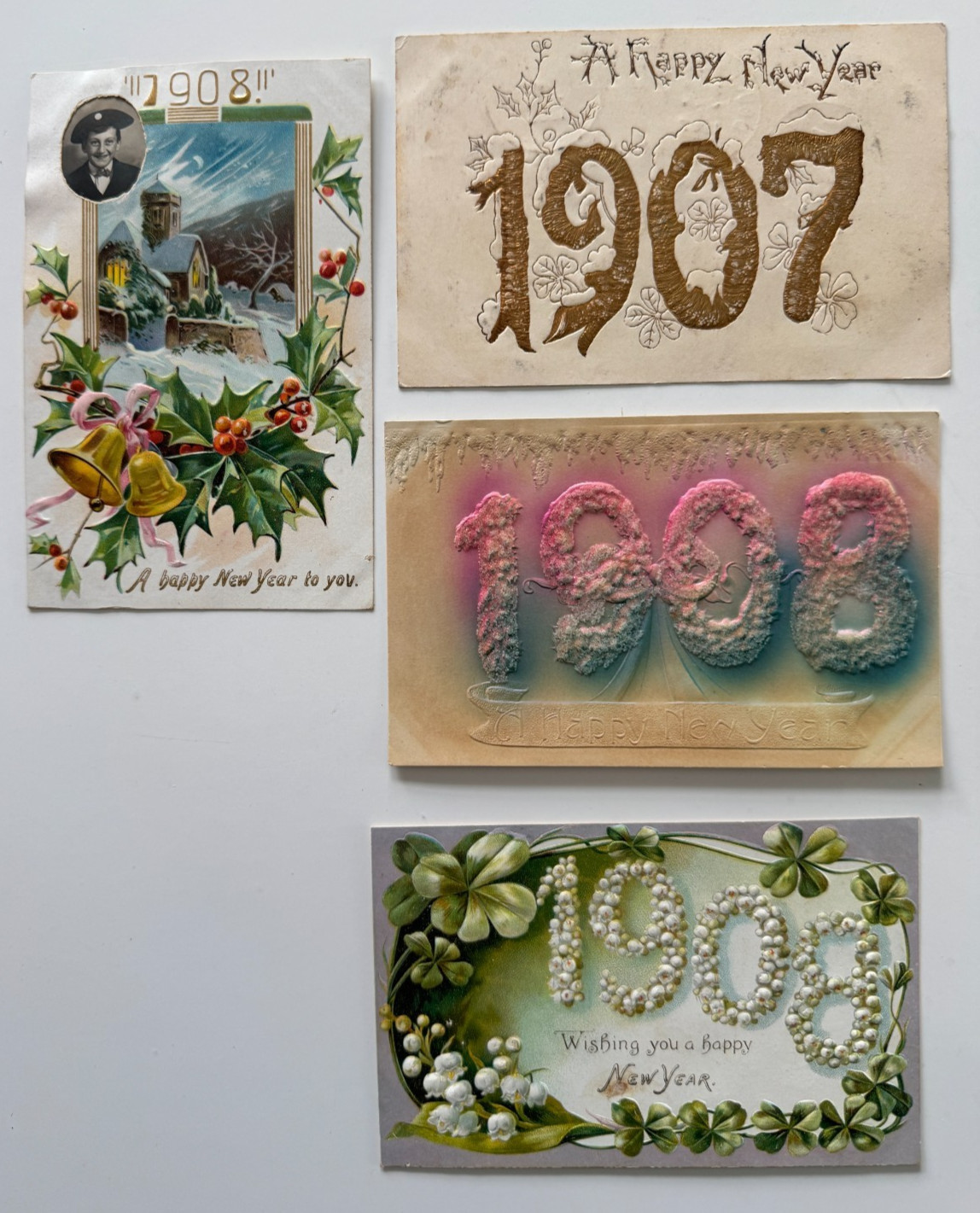 Lot (4) Vintage 1907/1908 Postcards Happy New Year Greetings antique embossed Lot (4) Vintage 1907/1908 Postcards Happy New Year Greetings antique embossed