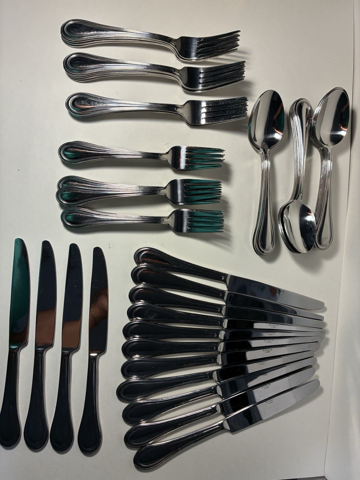 15 Settings Of Towle China Flatware; Knives, Large & Small Spoons, Large Forks.