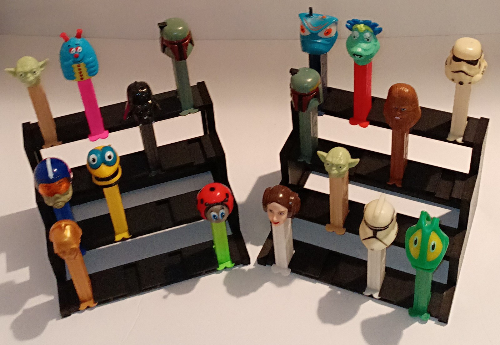 Eight 4-Teir PEZ Display Stands Holds Total of 128 PEZ - Dispensers Not Included Eight 4-Teir PEZ Display Stands Holds Total of 128 PEZ - Dispensers Not Included