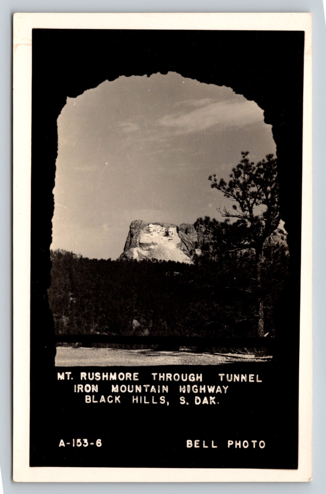 RPPC Mt. Rushmore from Tunnel Iron Mountain Highway BLACK HILLS SD VTG Postcard