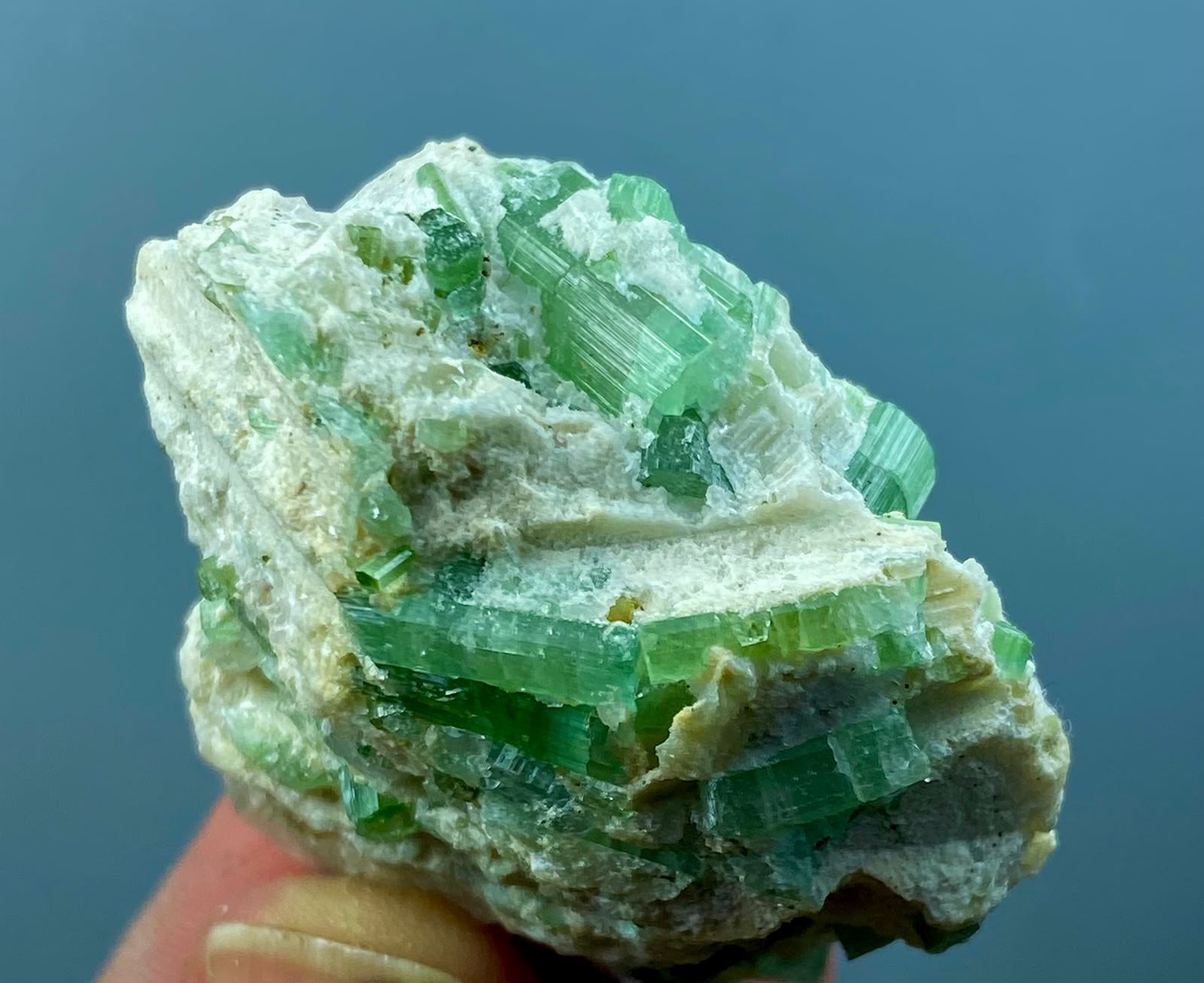 natural green crystal mineral specimen on white matrix display 224 CT. Afghan