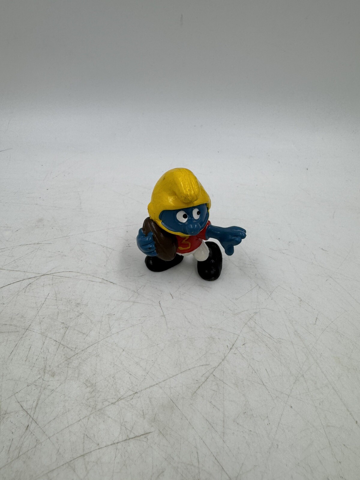 Vintage Peyo Schleich Plastic SMURF With Football and Helmet Vintage Peyo Schleich Plastic SMURF With Football and Helmet
