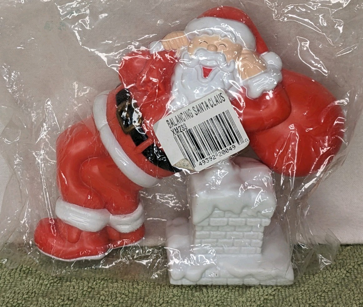 vintage Mrs. Santa Claus Plastic carrying Holiday  gift bag leaning on chimney 