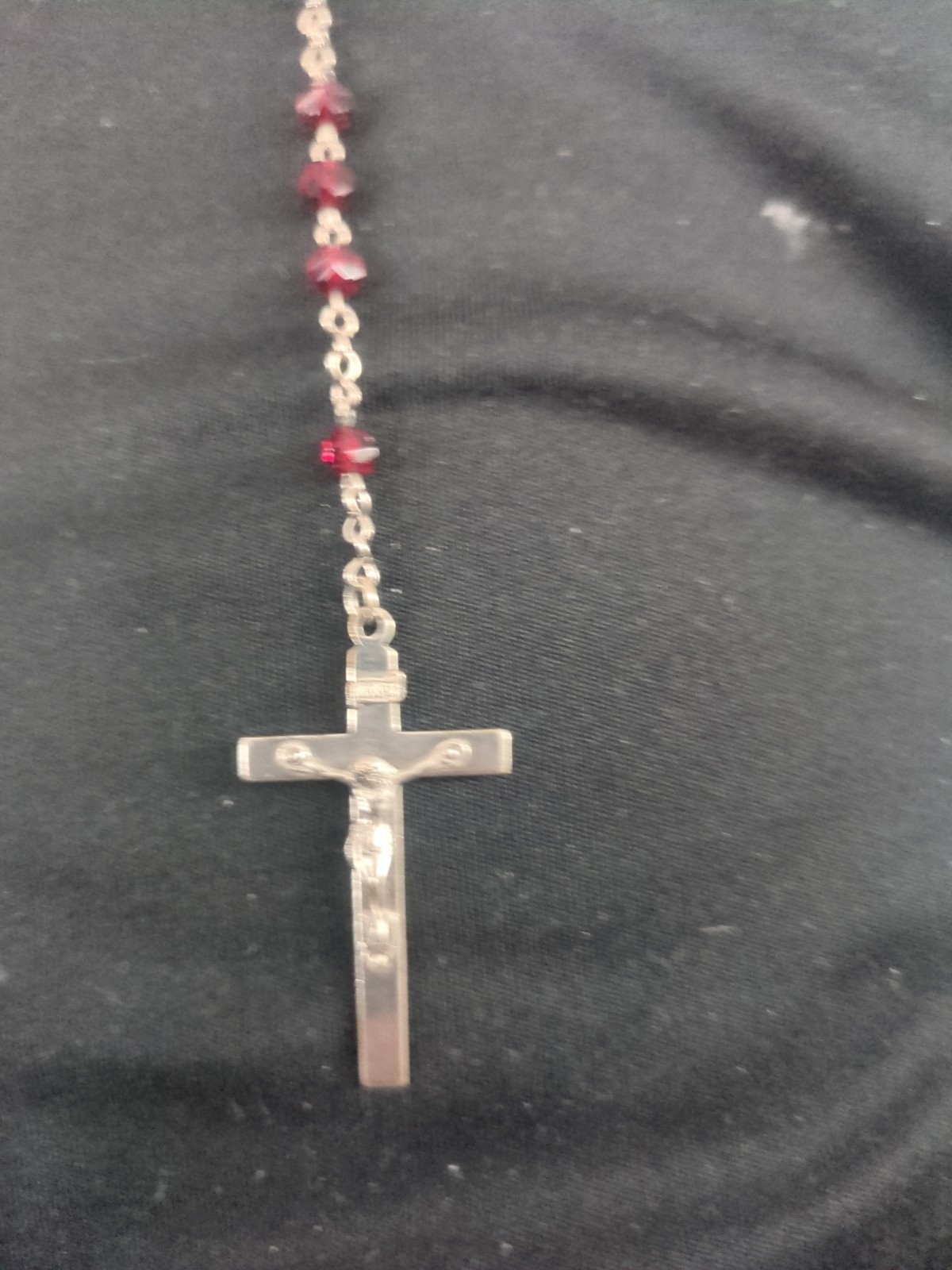 Vint image shows a Catholic rosary necklace featuring deep red crystal or glass
