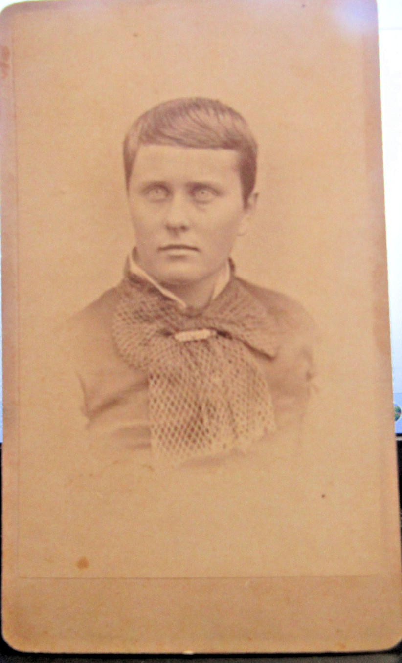 Antique CDV Photo of Woman? with large bow Paola, Kansas by Howard Antique CDV Photo of Woman? with large bow Paola, Kansas by Howard