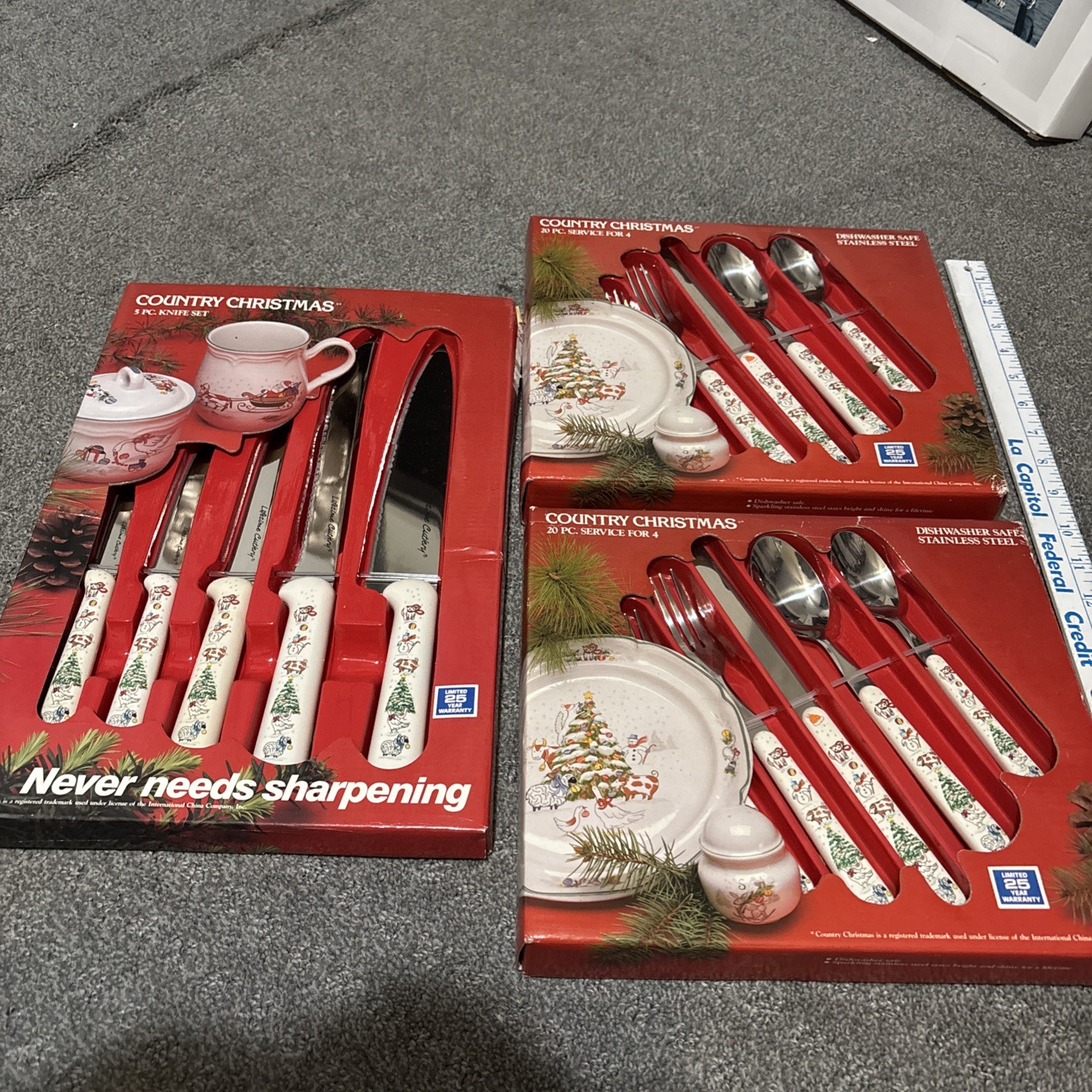 VNT 1988 country Christmas Stainless Steel 3 boxed NWT knife & (2) 20pc eatery. VNT 1988 country Christmas Stainless Steel 3 boxed NWT knife & (2) 20pc eatery.