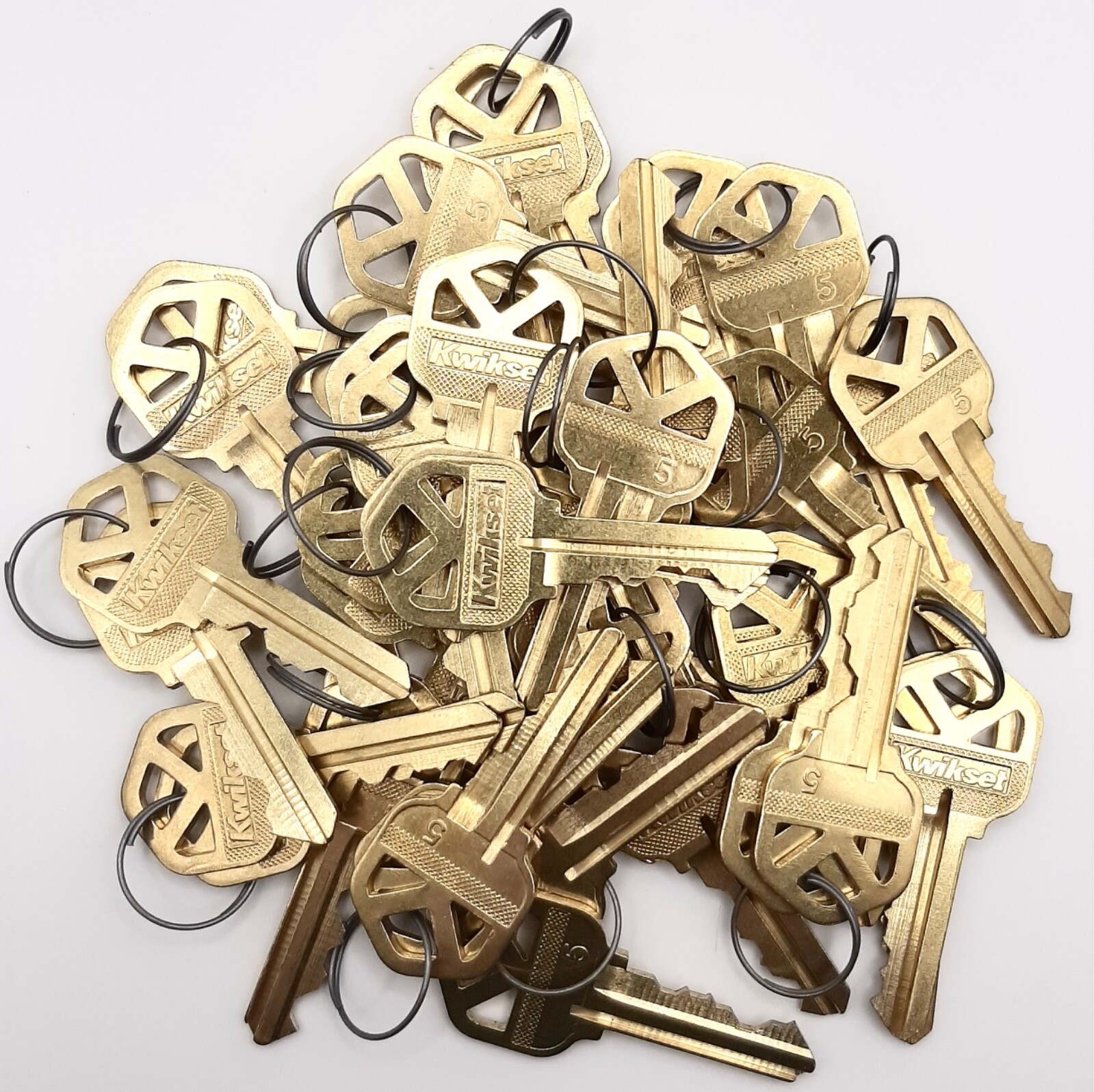 New Kwikset factory brass precut keys. 40 keys, 20 pairs. Locksmith, rekeying New Kwikset factory brass precut keys. 40 keys, 20 pairs. Locksmith, rekeying