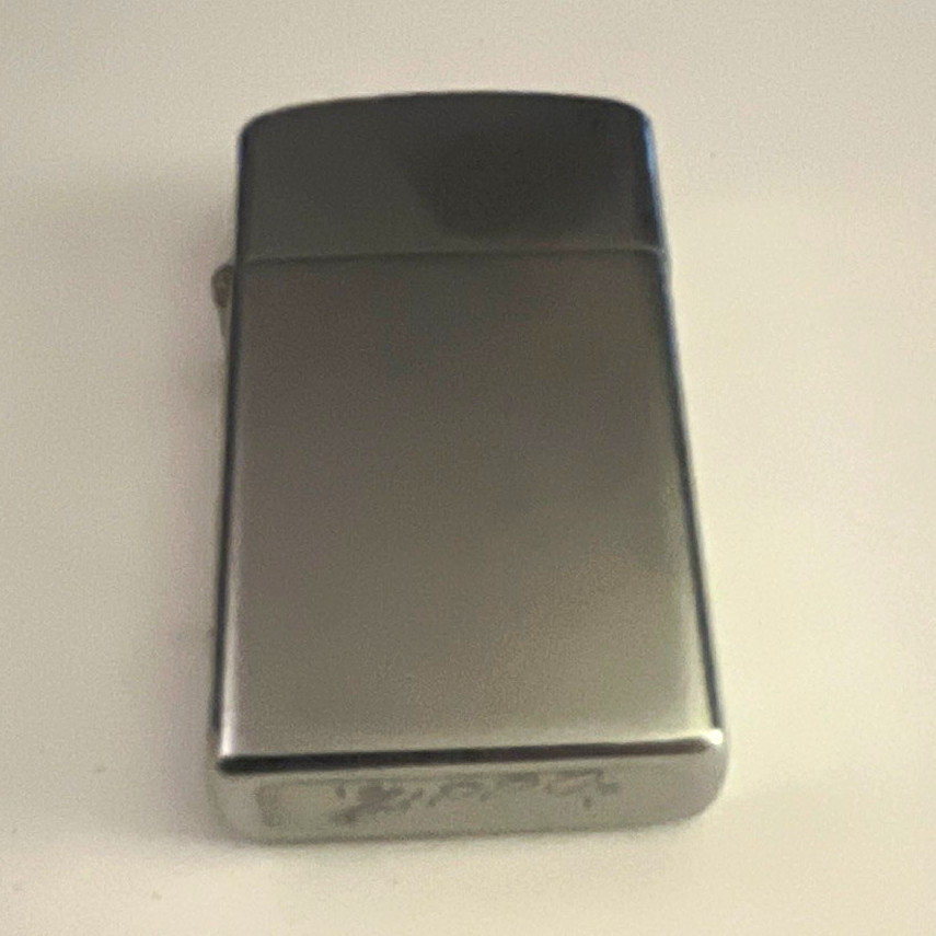 Vintage Zippo slim guessing 60s
