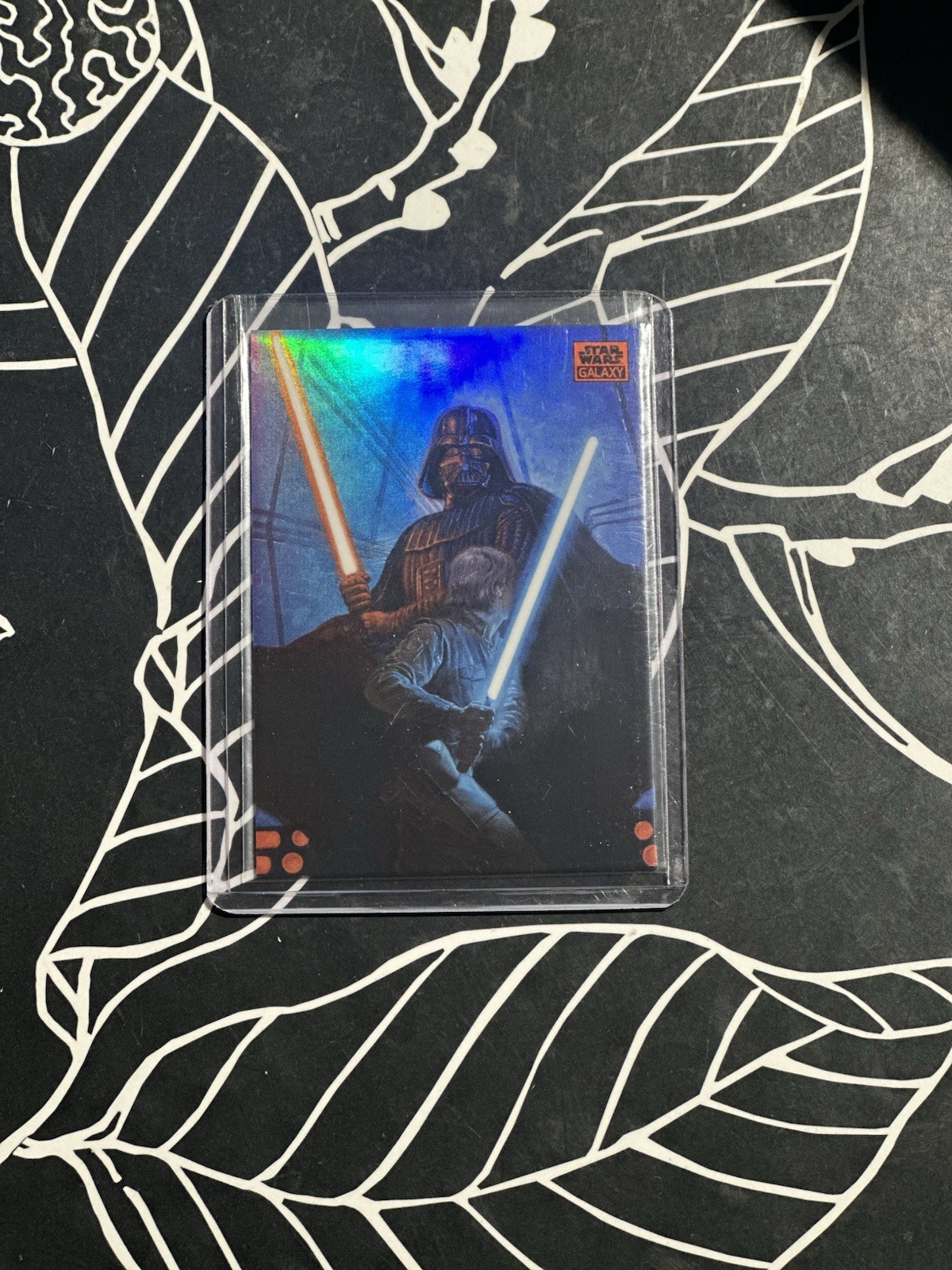 2025 Topps Star Wars Galaxy Confrontation #24 Orange Refractor /25 Luke & Vader 2025 Topps Star Wars Galaxy Confrontation #24 Orange Refractor /25 Luke & Vader
