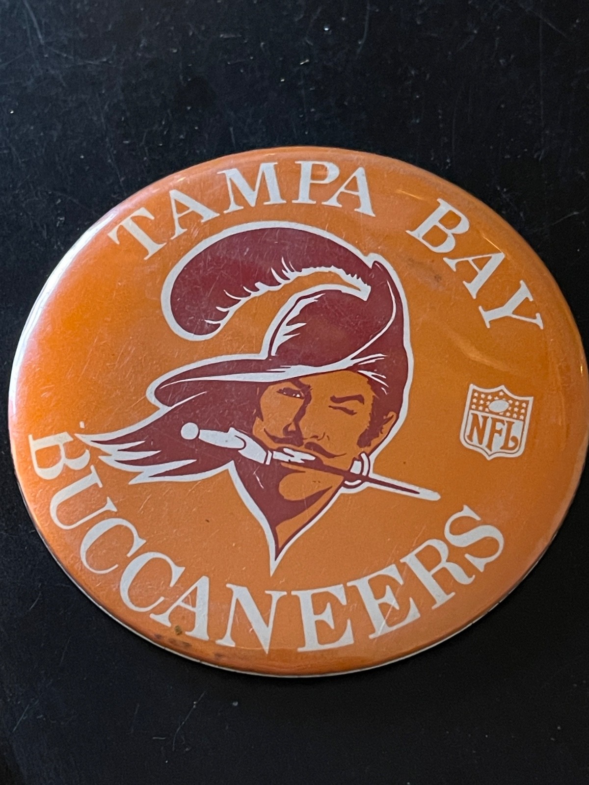 Vintage NFL football team Tampa Bay Buccaneers pin back button. Vintage NFL football team Tampa Bay Buccaneers pin back button.