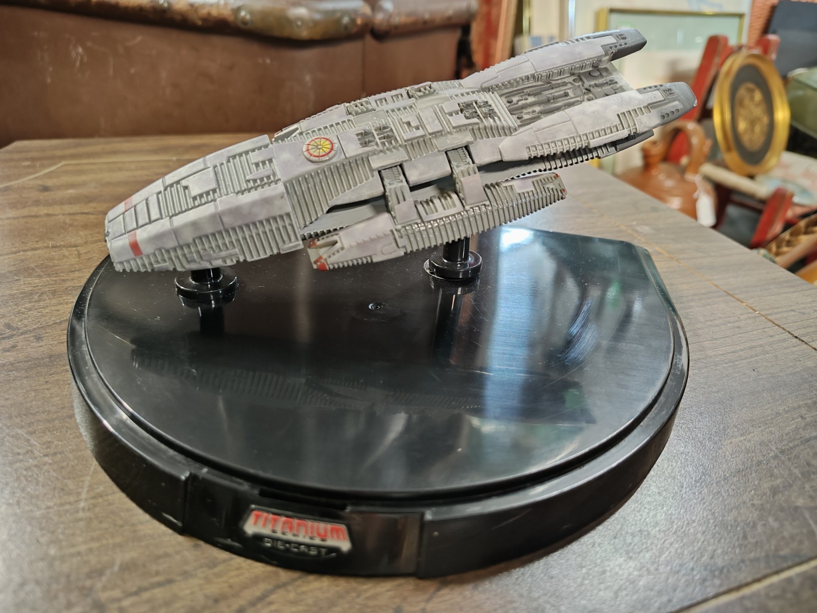 Hasbro Titanium Series Ultra Die-Cast Battlestar Galactica ship, in display case