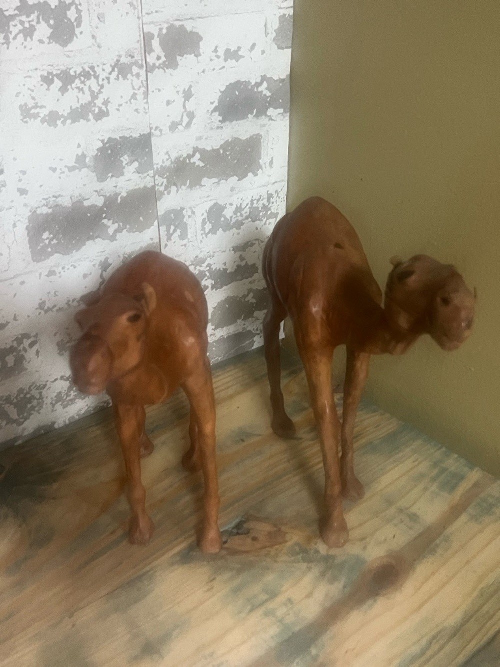 Set of vintage handcrafted brown leather-wrapped camel figurines Life like eyes Set of vintage handcrafted brown leather-wrapped camel figurines Life like eyes