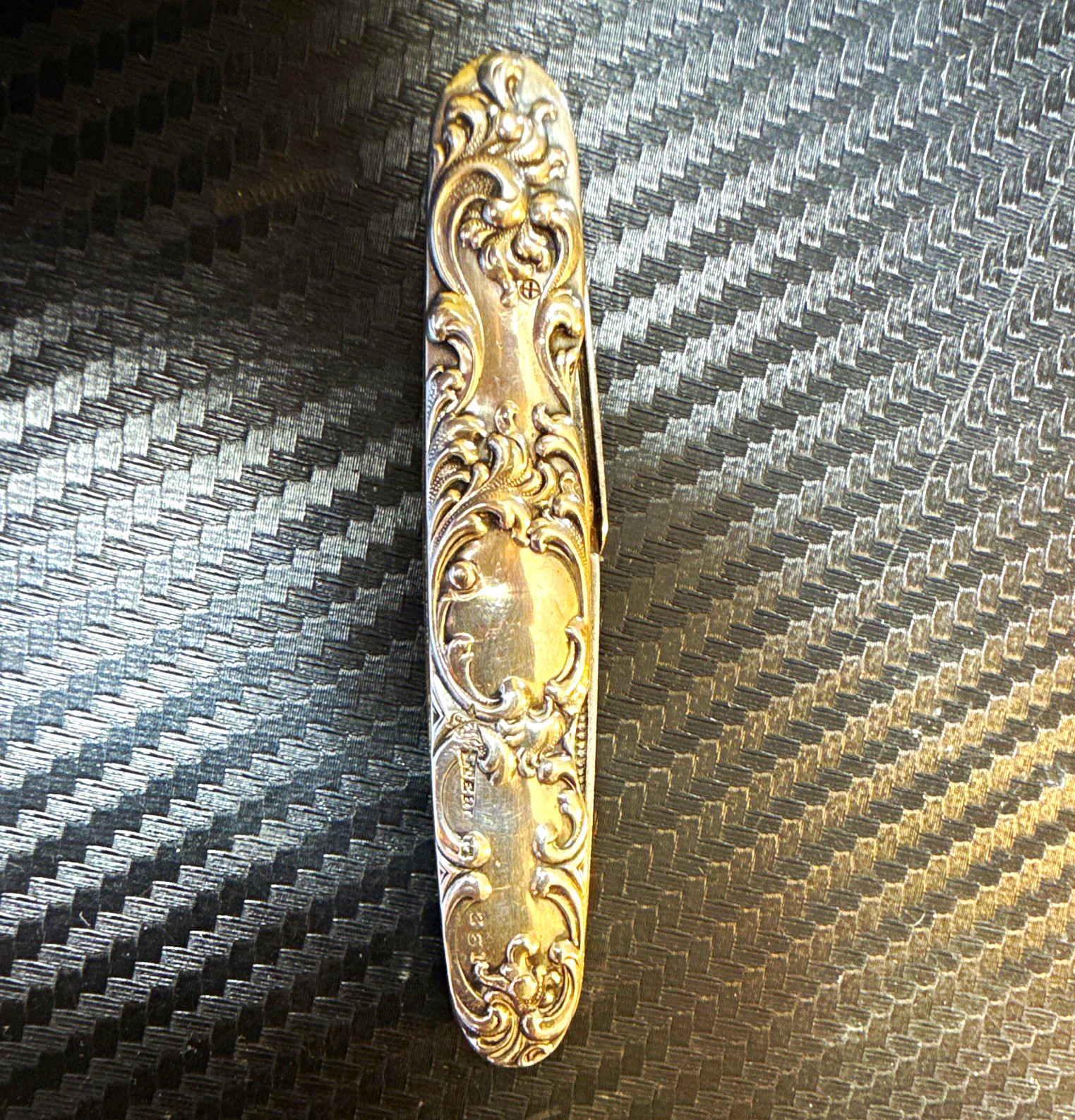 Antique sterling silver-handled pocket knife, from around 1890 to 1915. USA Antique sterling silver-handled pocket knife, from around 1890 to 1915. USA