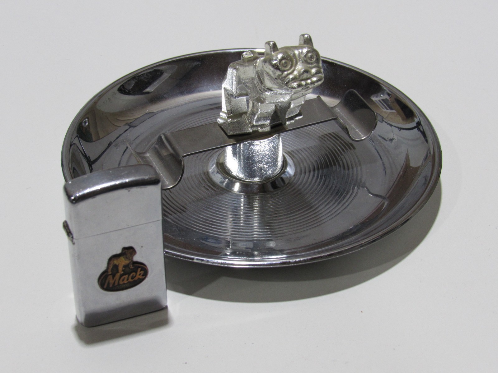VTG 60's MACK TRUCK ASHTRAY + ZIPPO KEITH SMYKAL NEW YORK NY RARE ORNAMENT CIGAR VTG 60's MACK TRUCK ASHTRAY + ZIPPO KEITH SMYKAL NEW YORK NY RARE ORNAMENT CIGAR
