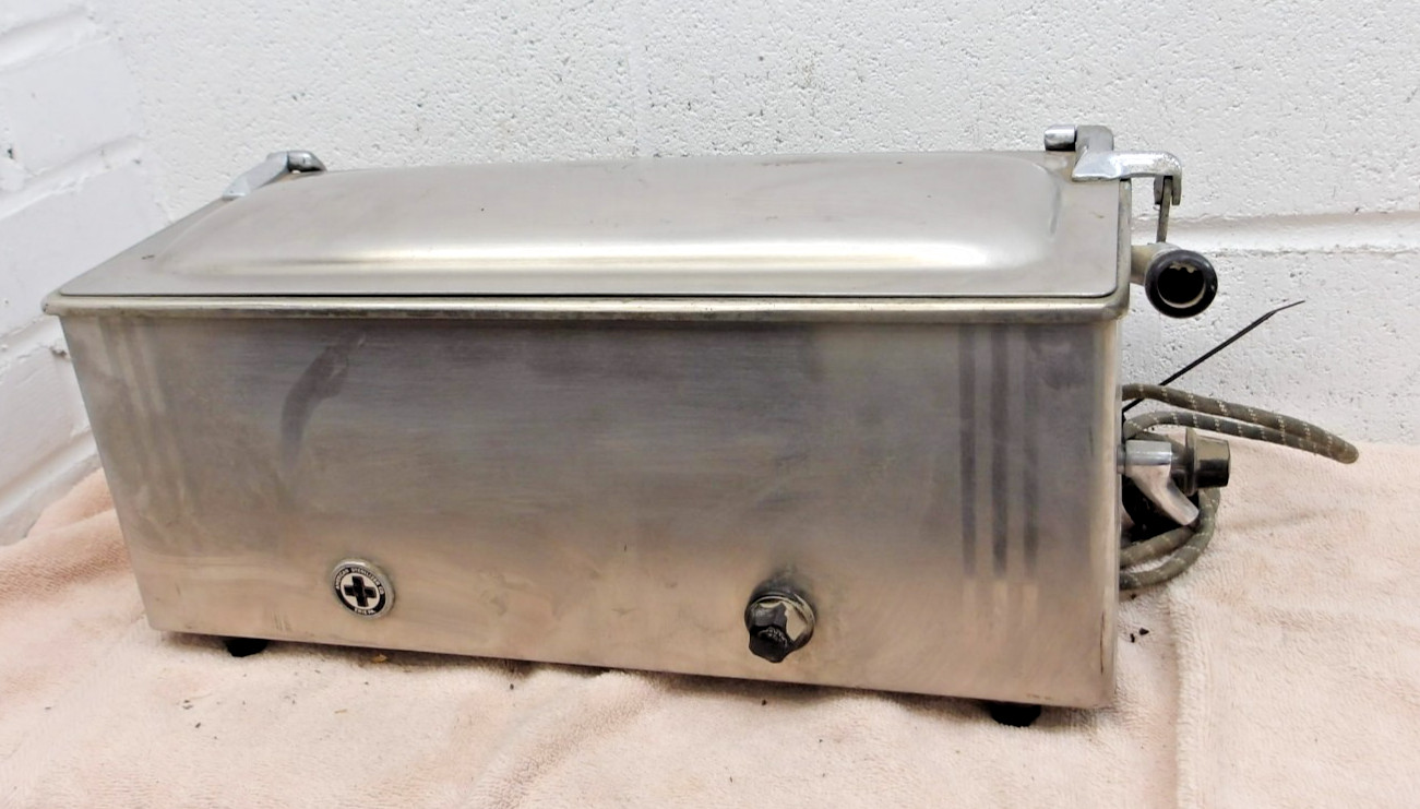 vintage 1940's electric stainless steel electric medical instrument sterilizer. vintage 1940's electric stainless steel electric medical instrument sterilizer.
