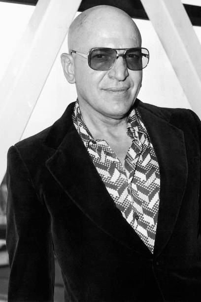 Telly Savalas Greek actor seen here at Heathrow Airport Circa 1975 Old Photo