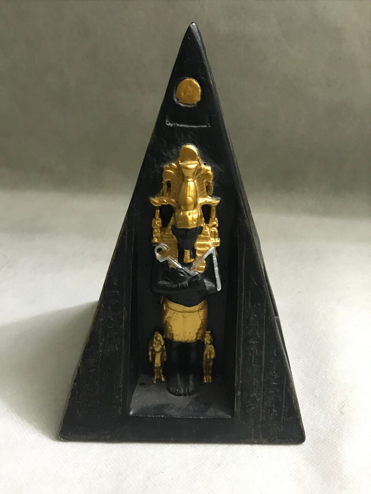 A pyramid statue of Osiris and Horus, symbols of the kings of ancient Egypt A pyramid statue of Osiris and Horus, symbols of the kings of ancient Egypt