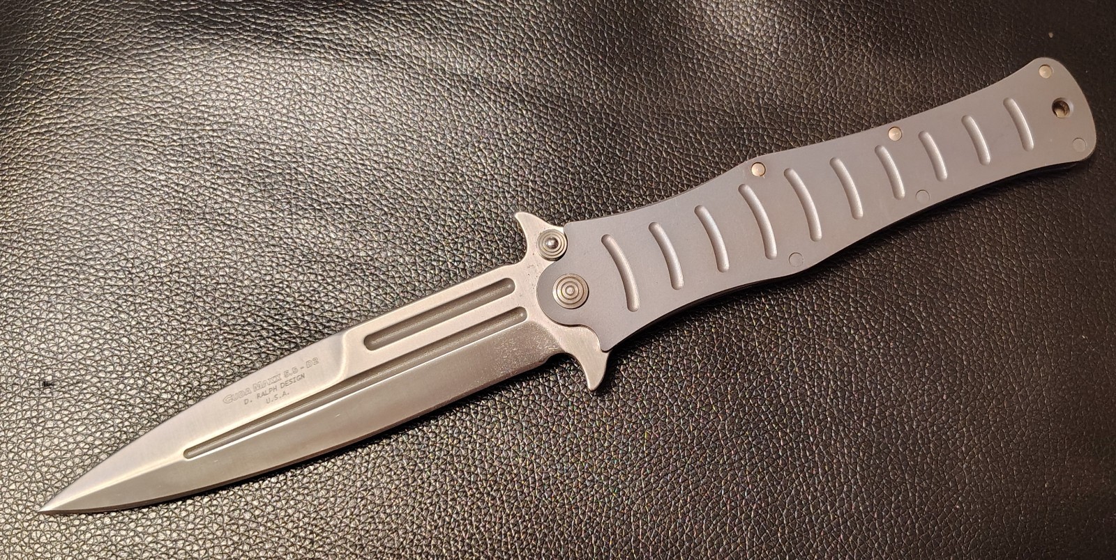 Camillus CUDA MAXX Knife Titanium Frame, 5.5 D-2 spear point Blade, Flip Open Camillus CUDA MAXX Knife Titanium Frame, 5.5 D-2 spear point Blade, Flip Open