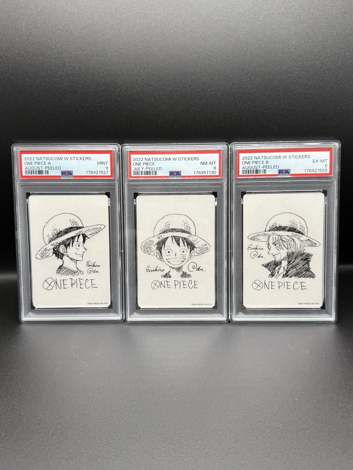 PSA 9 8 6 One Piece Natsucomi 2022 Luffy Shanks Eiichiro Oda Sticker 3 Card Set PSA 9 8 6 One Piece Natsucomi 2022 Luffy Shanks Eiichiro Oda Sticker 3 Card Set