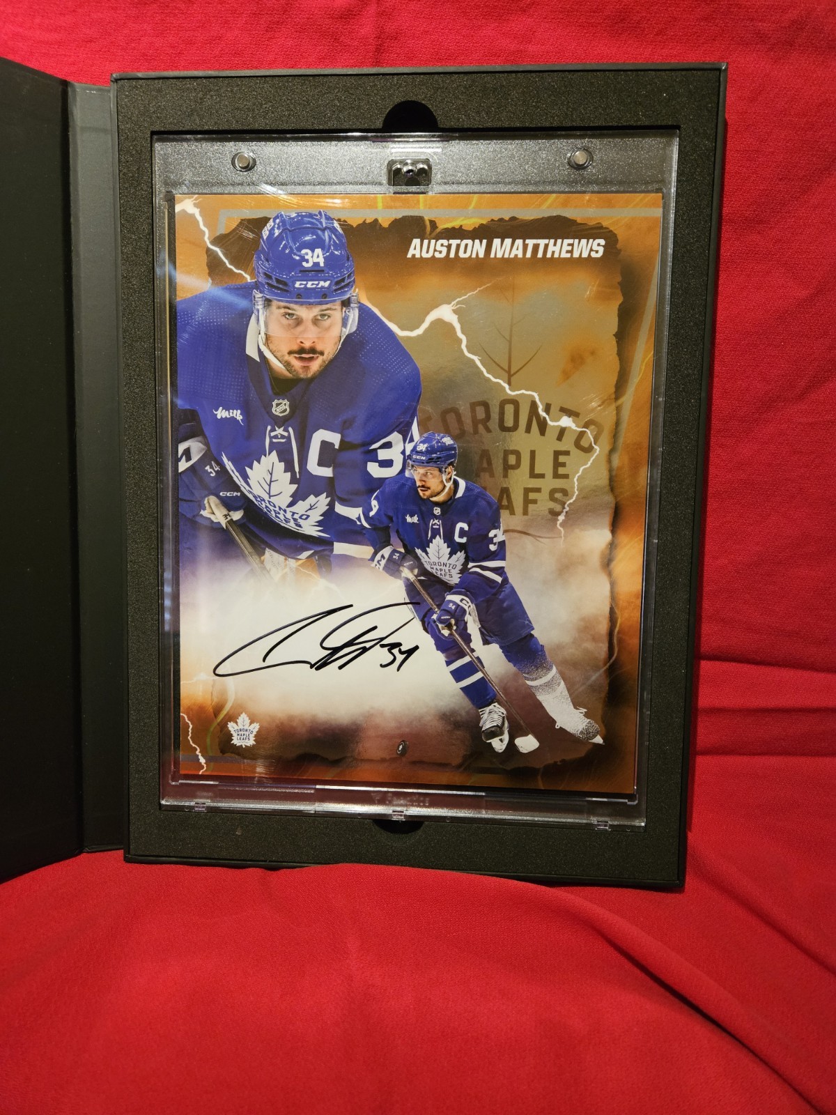 2024-25 Fanatics Under Wraps Auston Matthews Orange 17 / 25 Autographed