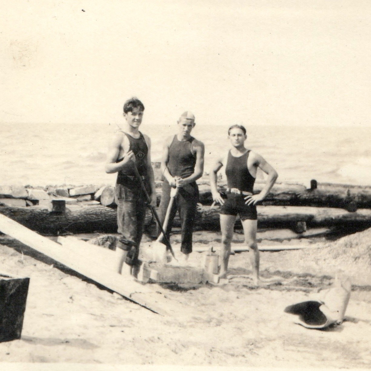 c1920s Beach Shoreline Seawall Construction Men Snapshot Photo Swimsuits Shovels