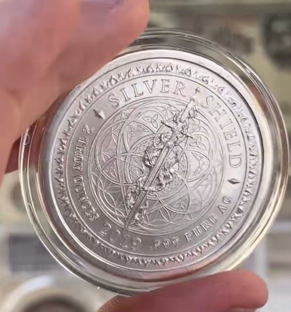 2 oz 2019 Consumerism Silver Shield, Slave Card Santa Skull, .999 Pure AG Silver