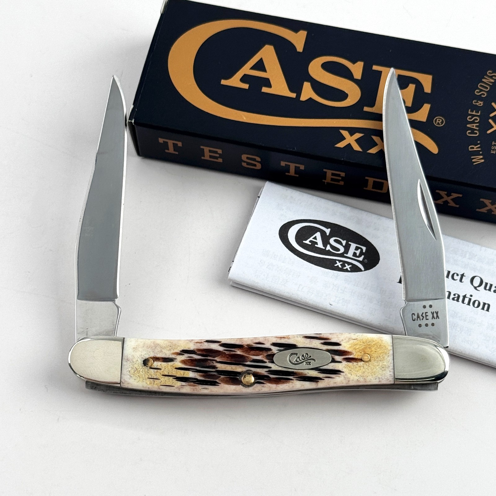 Case XX 10798 Muskrat Jigged Amber Bone 2-Blade Stainless Steel Pocket Knife Case XX 10798 Muskrat Jigged Amber Bone 2-Blade Stainless Steel Pocket Knife