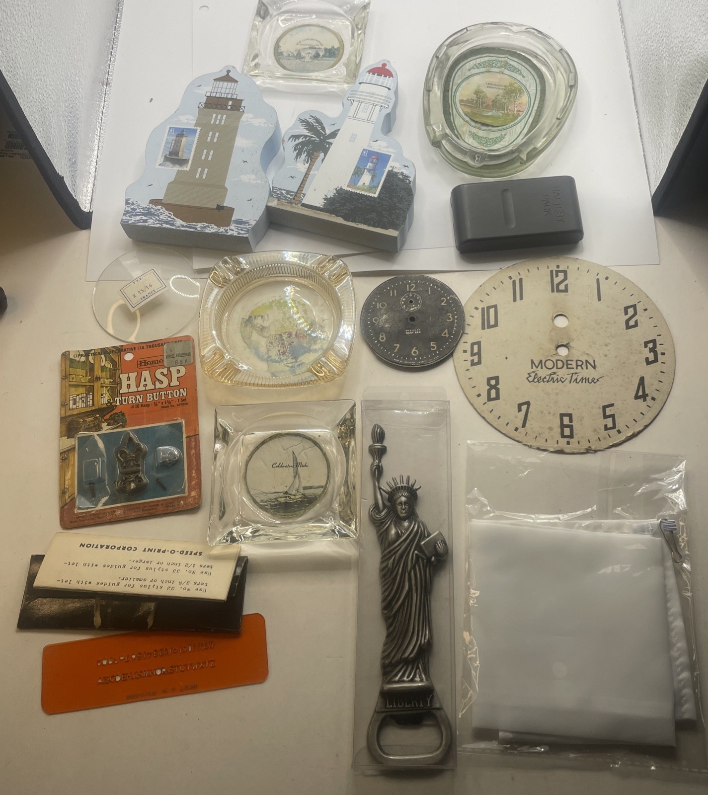 Vintage Junk Drawer Lot Ashtrays Bottle Opener Wooden Lighthouses Clock Faces