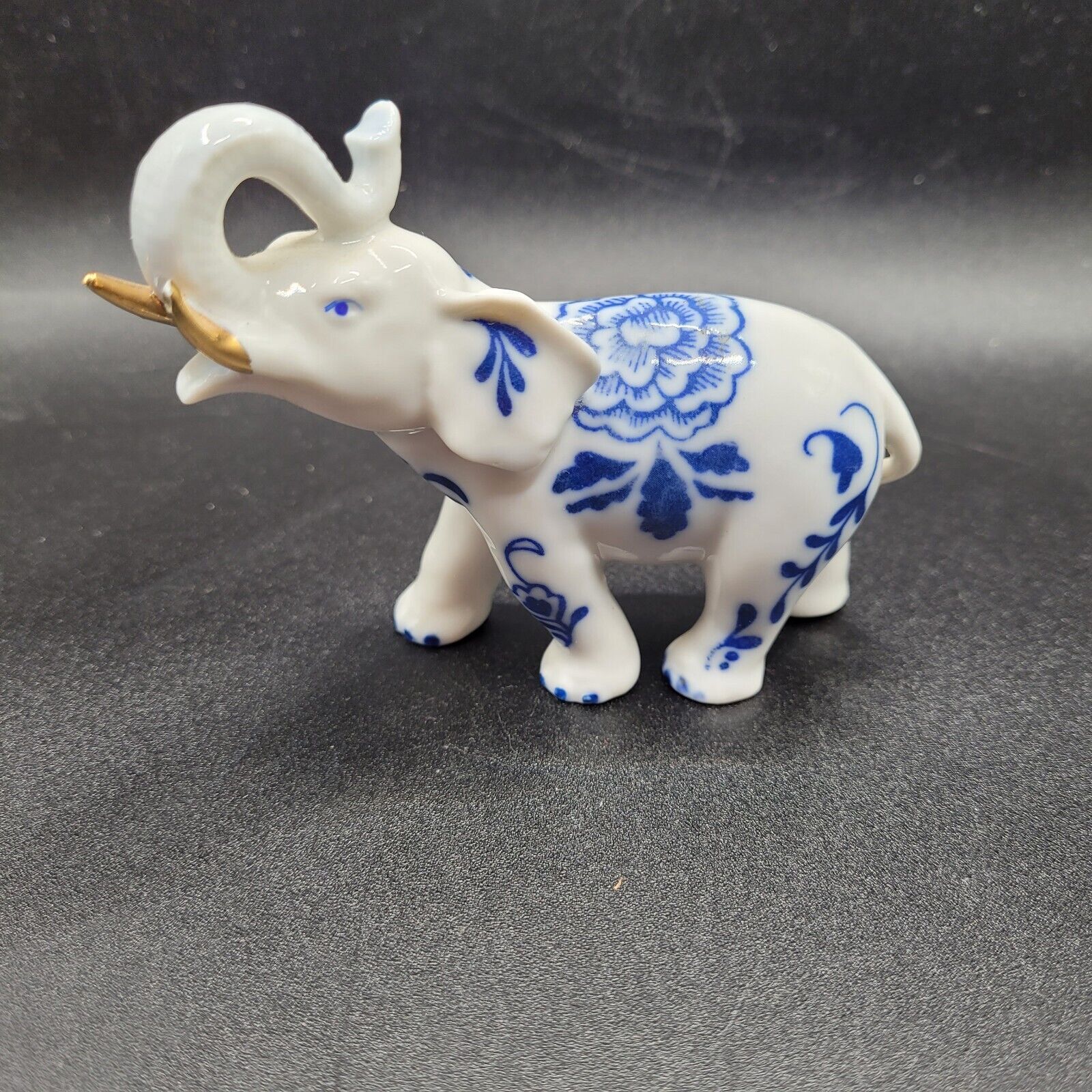 blue and white porcelain elephant figurine Marked PG Made In Malaysia 
