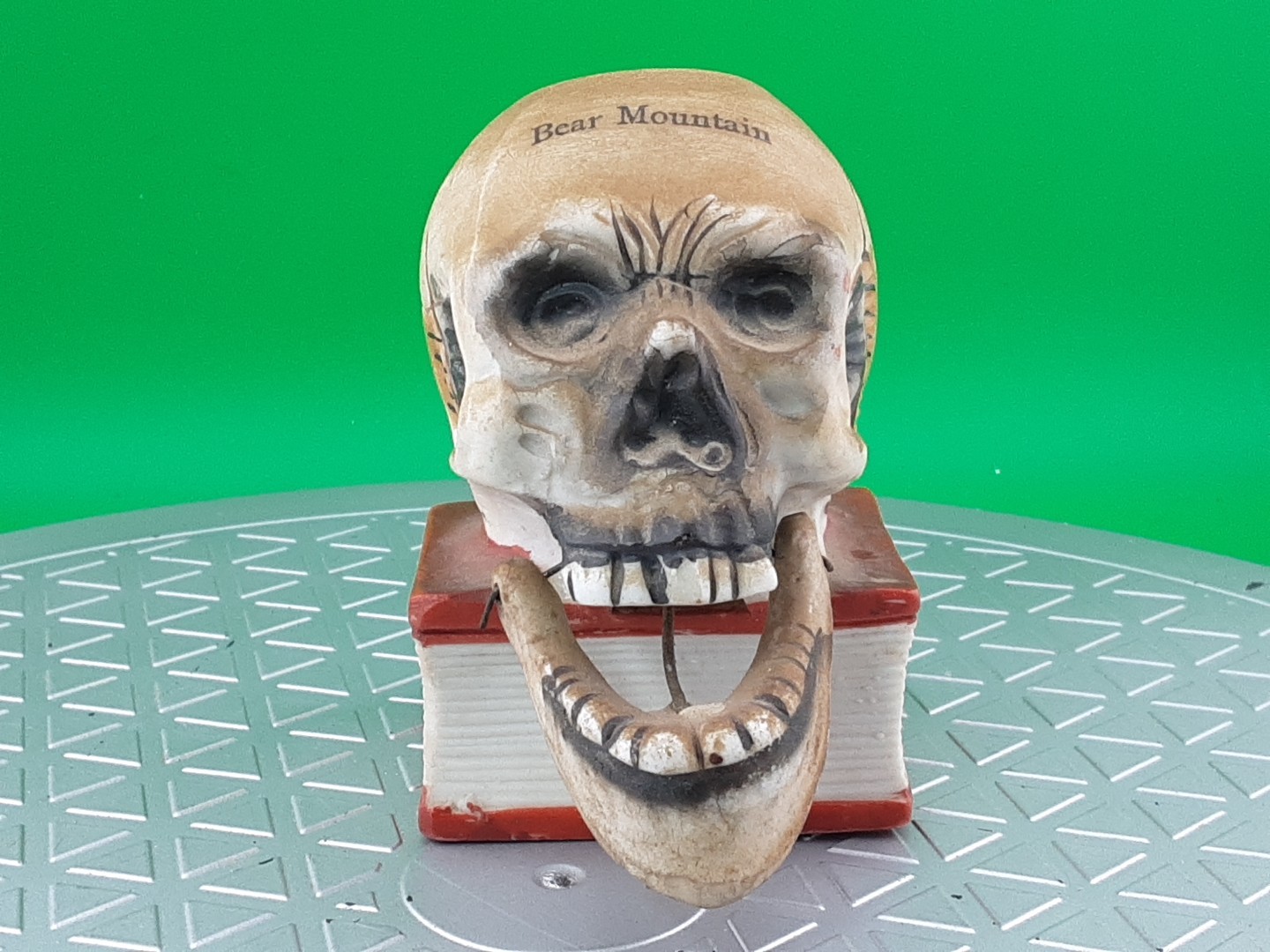 1960’s Japanese Ceramic Bisque Skull on Book Moveable Jaw Candle Holder Souvenir