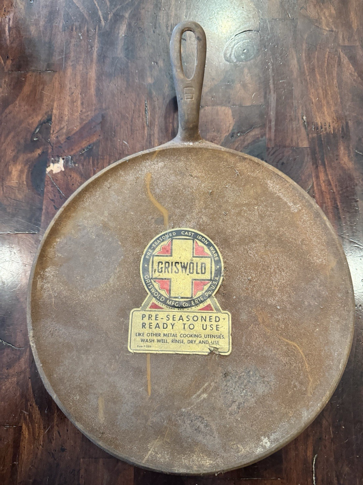 Griswold Cast Iron Number 9 Griddle With Original OEM Sticker. Griswold Cast Iron Number 9 Griddle With Original OEM Sticker.