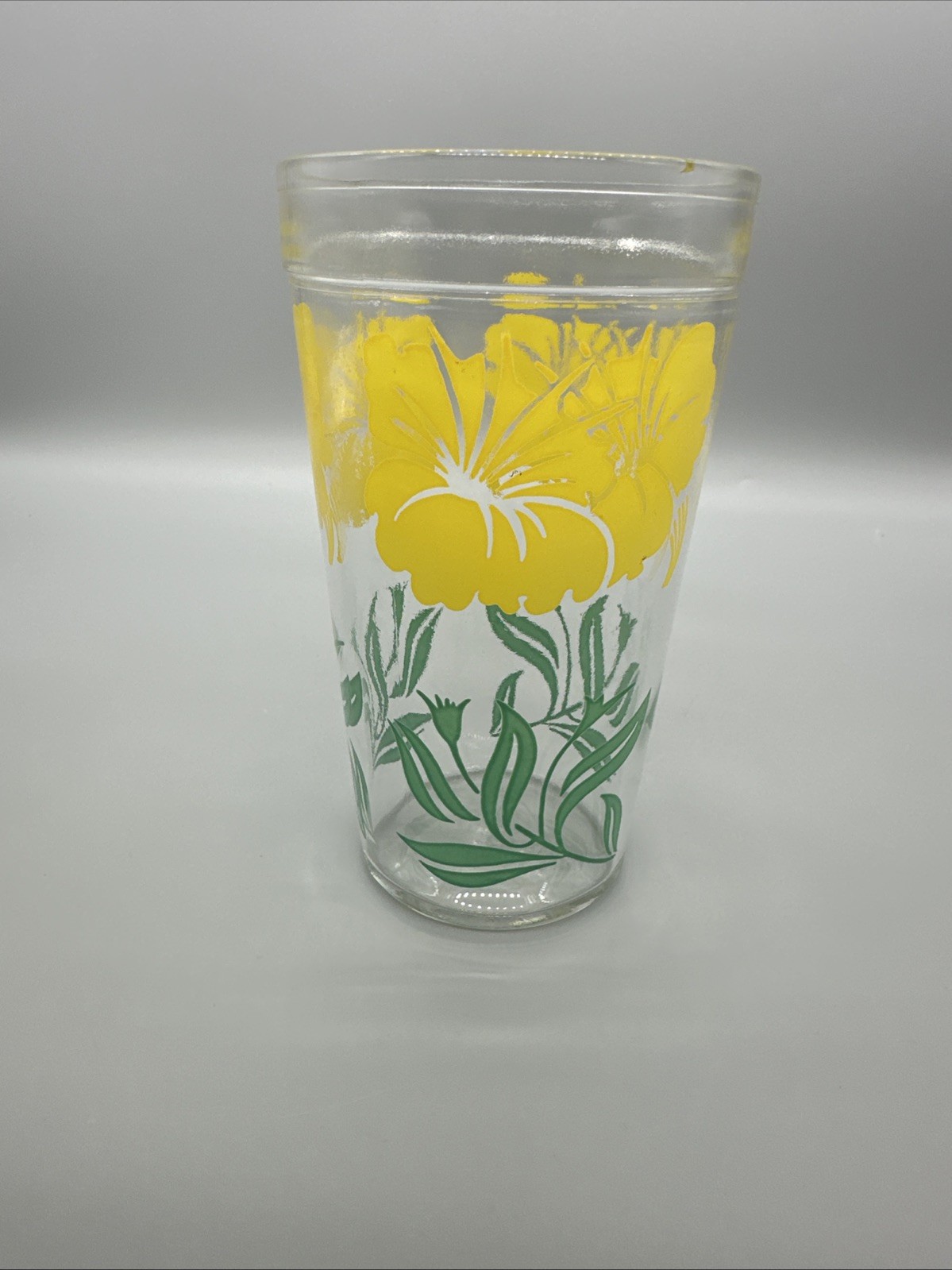 Vintage Boscul Peanut Butter glass with a vibrant Yellow Hibiscus pattern Vintage Boscul Peanut Butter glass with a vibrant Yellow Hibiscus pattern