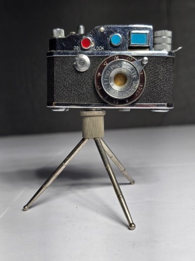 Vintage occupied Japan miniature camara and tripod lighter collectable