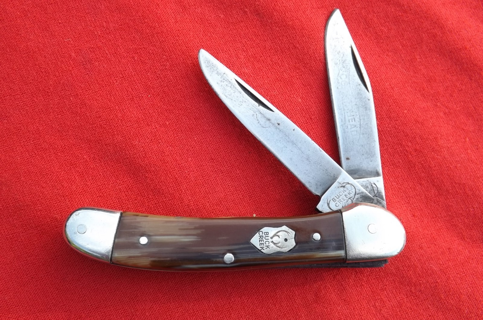 VINTAGE BUCK CREEK GERMANY BROWN STRIPE CELLULOID COPPERHEAD KNIFE USED VINTAGE BUCK CREEK GERMANY BROWN STRIPE CELLULOID COPPERHEAD KNIFE USED