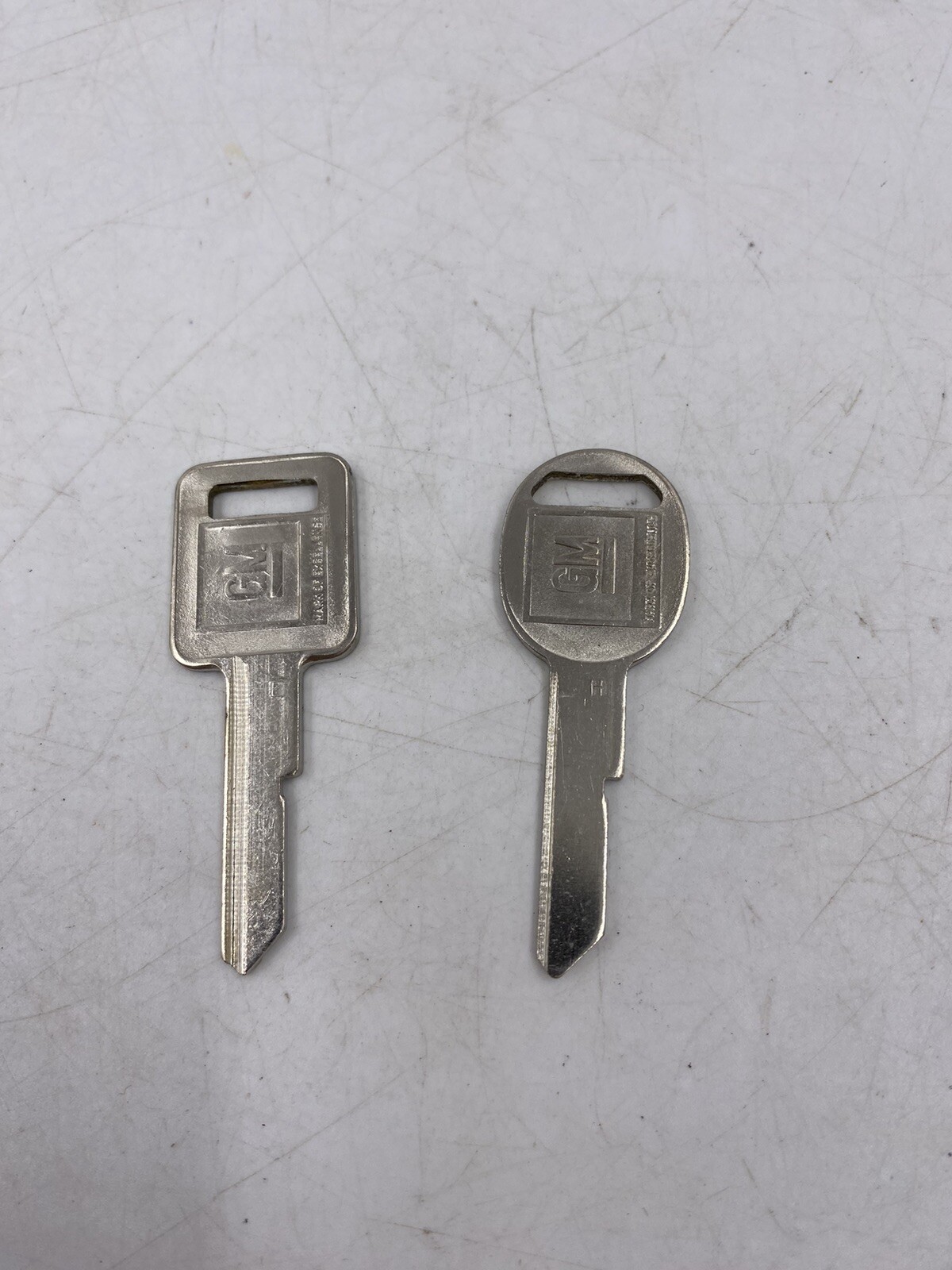 Set of 2 Vintage GM UNCUT Blank Keys Round and Square Key E and H Set