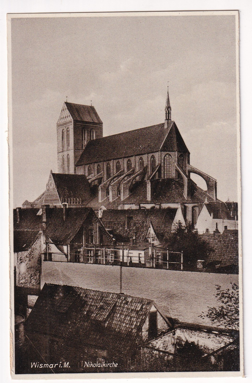 Wismar circa 1935?: Nicolai - Church above the rooftops by W., SW - photocard, ungel Wismar circa 1935?: Nicolai - Church above the rooftops by W., SW - photocard, ungel