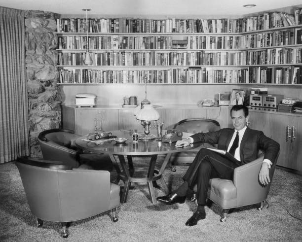 Canadian actor Glenn Ford sits a chair study home Beverly Hills Ca- Old Photo Canadian actor Glenn Ford sits a chair study home Beverly Hills Ca- Old Photo