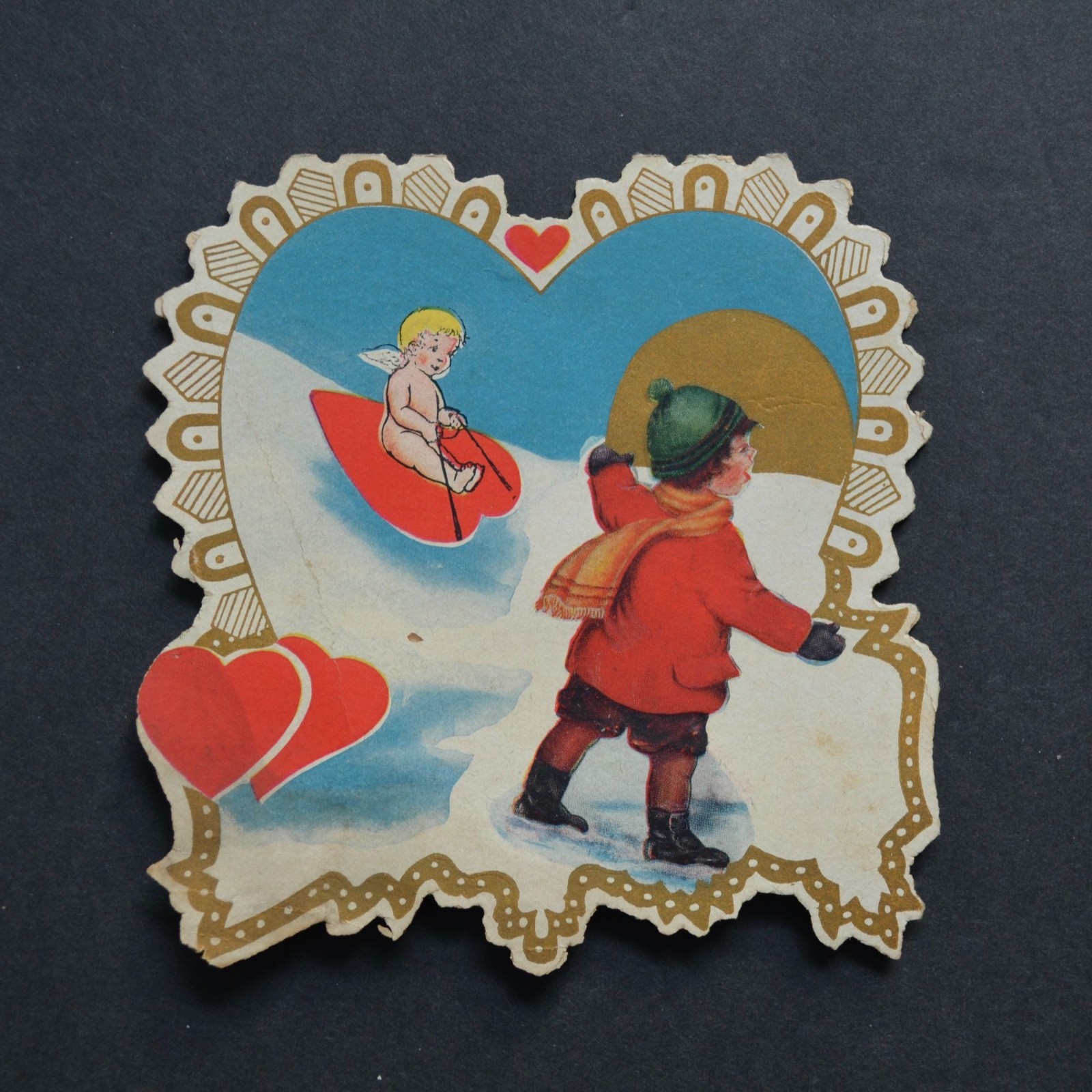 Vintage Whitney Made Valentine Card Cherub on Heart Sled