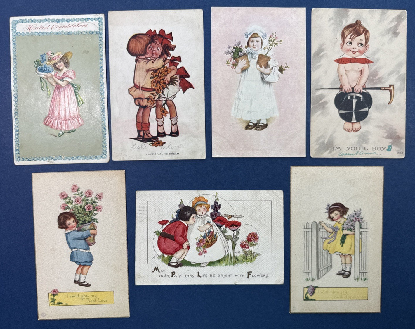 7 Children Greetings Antique Postcards. Drawn. EMB. Flowers. Romance.