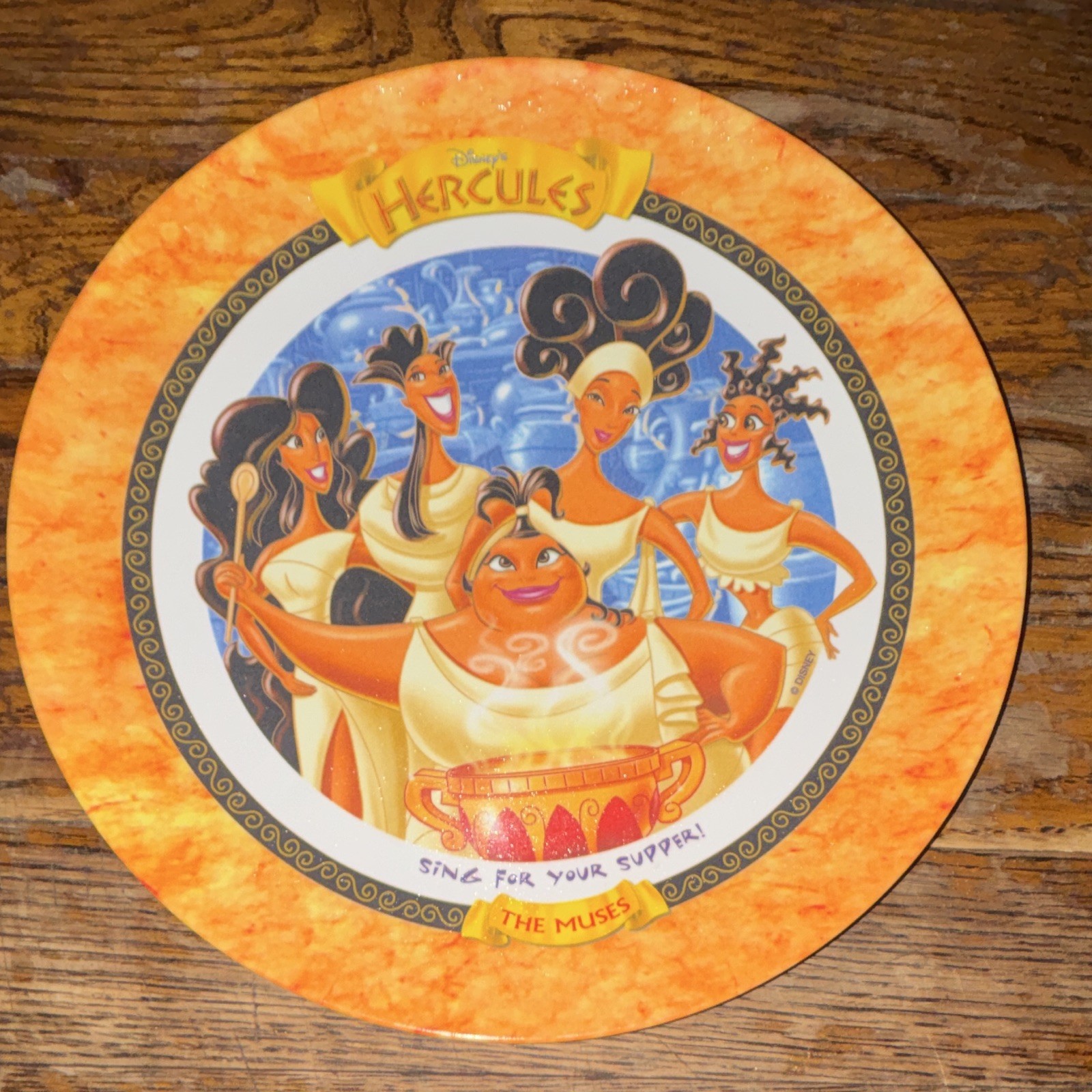 1997 McDonald’s Disney Hercules The Muses Sing for Your Supper Plate Orange 1997 McDonald’s Disney Hercules The Muses Sing for Your Supper Plate Orange