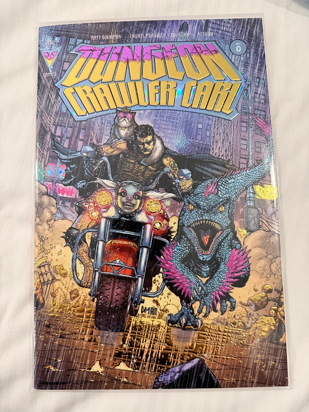 DUNGEON CRAWLER CARL #0 • NYCC EMBOSSED FOIL MAHNKE NIGHT RAIN VARIANT DUNGEON CRAWLER CARL #0 • NYCC EMBOSSED FOIL MAHNKE NIGHT RAIN VARIANT