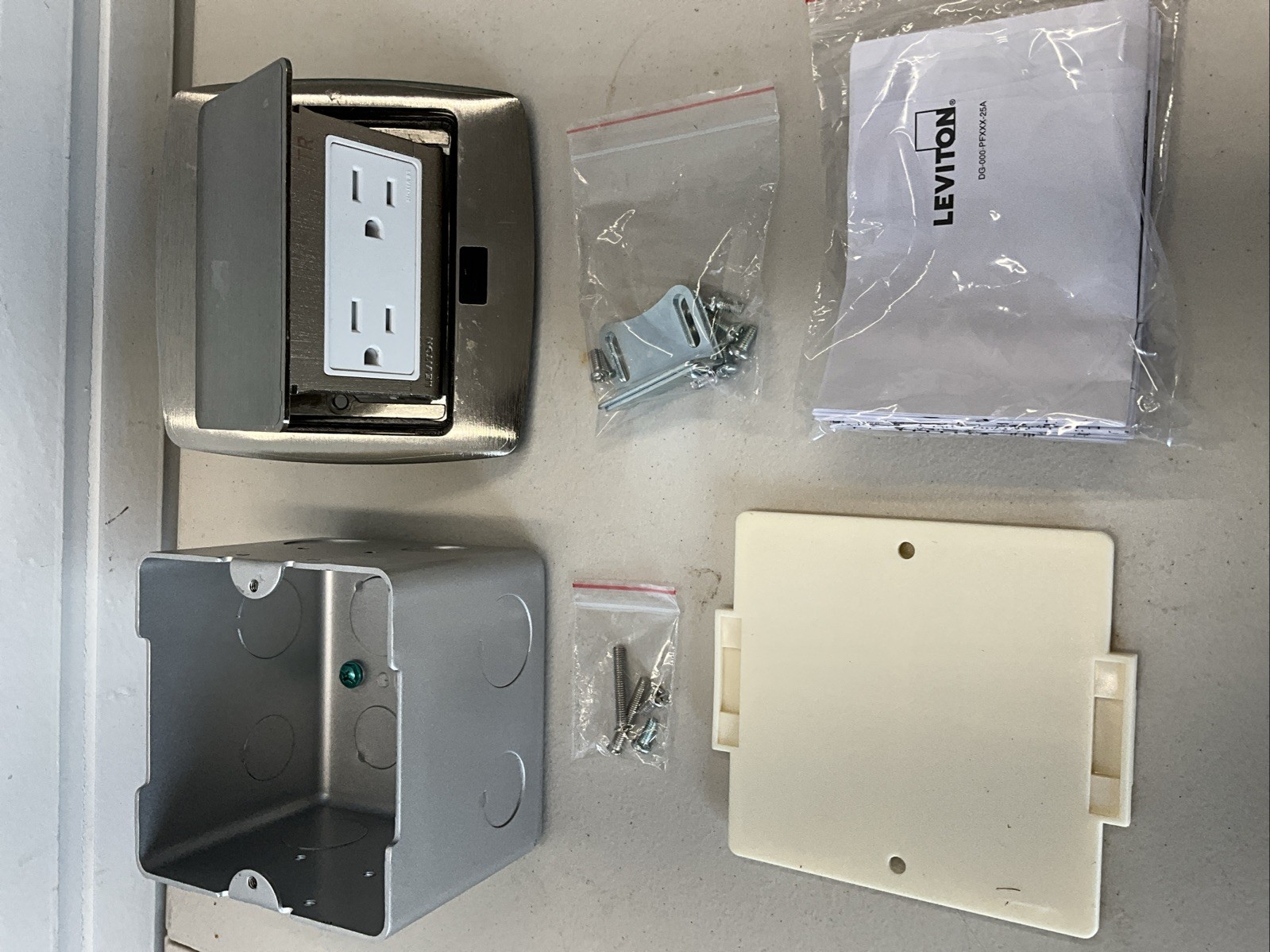 Leviton Pop-Up Floor Box with 15 Amp, Tamper-Resistant Outlet, Brushed Nickel... Leviton Pop-Up Floor Box with 15 Amp, Tamper-Resistant Outlet, Brushed Nickel...